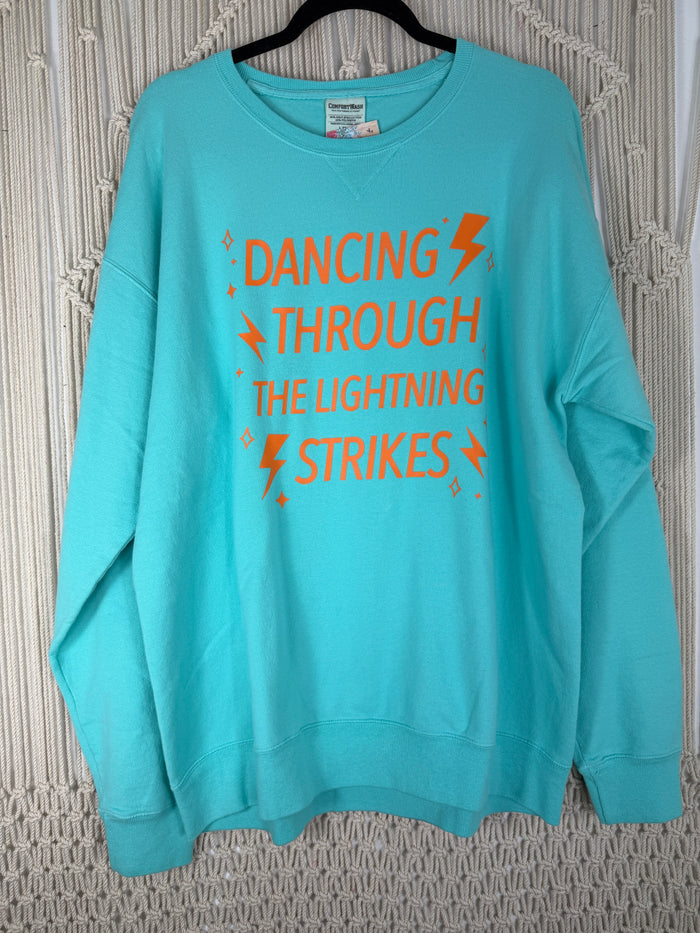 Dancing Through the Lightening Strikes Teal Sweatshirt